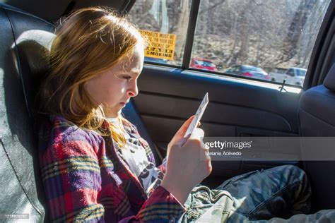 Young Redheaded Girl Short Hair Brown Hair Freckles Using Cellphone In