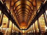 The Long Room library, Trinity College, Dublin, which holds the Book of ...