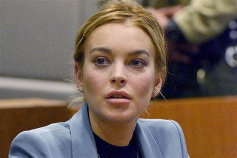 lindsay lohan to ask cops to investigate assault accuser claims woman should be prosecuted
