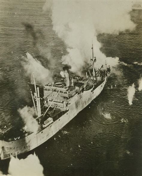 A Japanese Freighter Suffers A Hit To Her Stern During An Attack By B