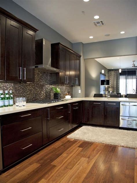 Use a brush to get into corners and detailed areas. Espresso cabinets and blue/grey wall paint. Try Java Gel ...