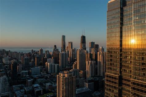 Drone Aerial View Of A Chicago Skyline And Lake Michigan During Sunset