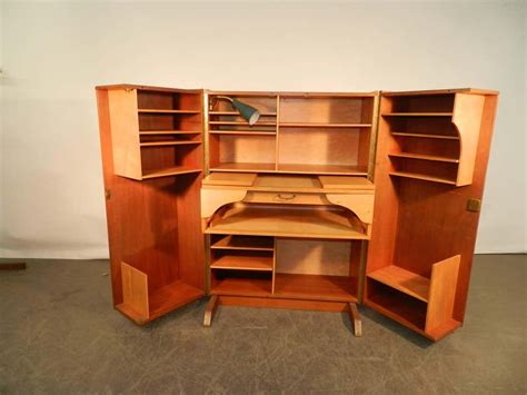 The compact disc first surfaced in the public eye 15 years after its invention when philips made an announcement on may 17, 1978. 1950 Compact Home Office Desk in Mahogany and Blond Wood ...