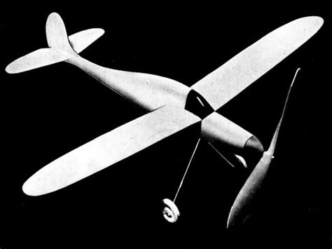 An Airplane Flying Through The Air With Propellers