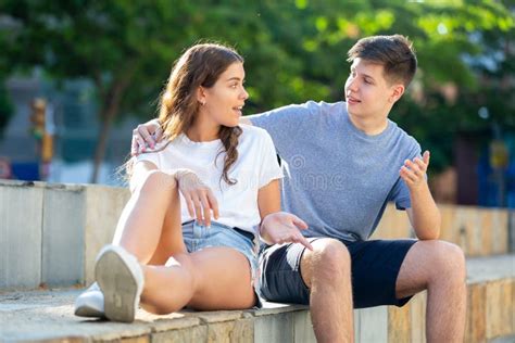 Portrait Of Two Teenage Friends Chatting Outdoors Stock Image Image