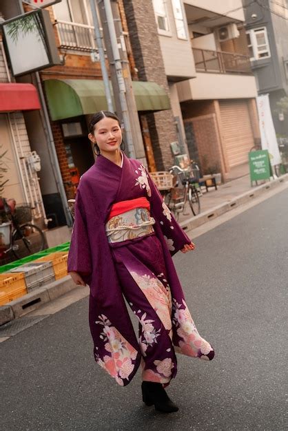 Free Photo Japanese Woman Celebrating Coming Of Age Day And Posing In