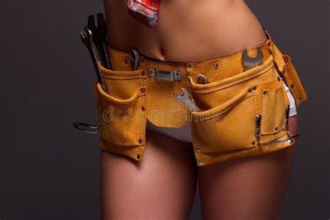female construction worker with tool belt stock image image of professional metal 84360889