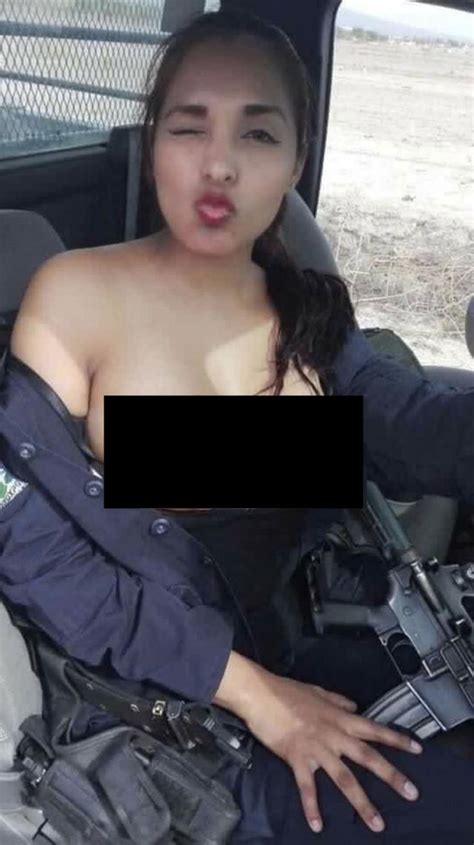 Mexican Police Officer Suspended After Topless Rifle Selfie Taken On Duty Goes Viral