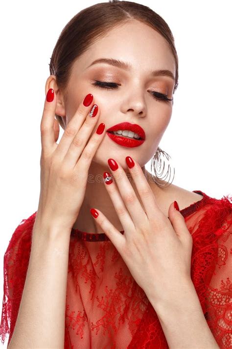 Beautiful Girl In Red Dress With Classic Make Up And Red Manicure Beauty Face Stock Image