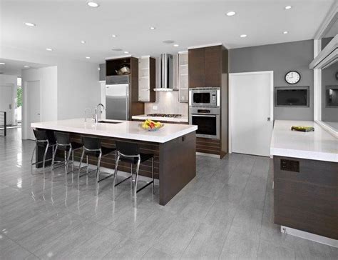 Gray kitchen cabinets with dark floors. modern kitchen with brown cabinets | Grey kitchen floor, Modern kitchen interiors, Modern ...