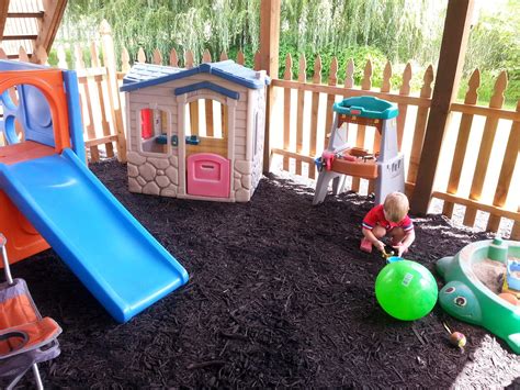 The Hotdish Mom Under Deck Landscaping And Fenced Kids Play Area