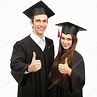dos estudiantes graduados felices aislados en blanco — Foto de stock ...