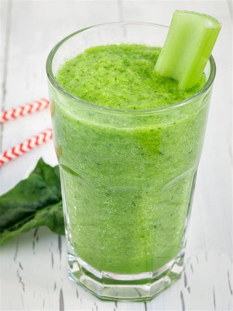 Green Smoothie With Celery Cucumber Spinach Apple And Lemon On A