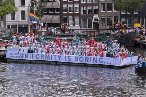 gaypride canal parade with boats at amsterdam the netherlands 6 8 2022 editorial photo image