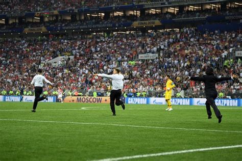 Pussy Riot Pitch Invader Tackled By Dejan Lovren As Protesters Halt World Cup Final Daily Record