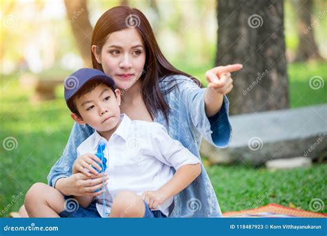 Beautiful Asian Mother Playing With Her Lovely Son Stock Free