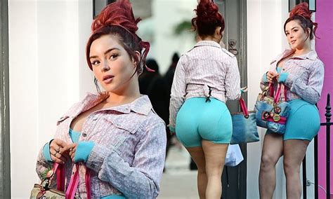 Demi Rose Flaunts Her Peachy Rear In Very Tight Cycling Shorts As She Poses For Sizzling