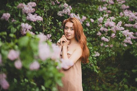 Portrait Of Female In Blossom Garden By Stocksy Contributor Serge