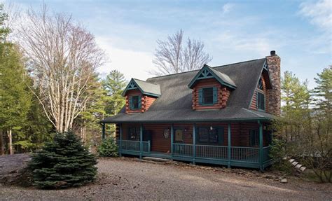With classic adirondack fireplace, dining room, kitchen, den, office, sun room, and two large decks overlooking the lake. Luxurious Lakeside Log Cabin in the Catskills - Upstate ...