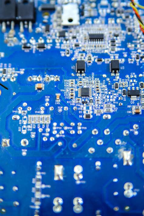 Blue Circuit Board Close Up With Microelements Different Shapes Stock
