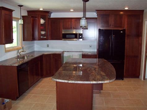 Wood is a common material in kitchen cabinetry today, and cherry kitchen cabinets are among the most popular options. The Best Color Granite for Cherry Cabinets and Hardwood Floors — OZ Visuals Design
