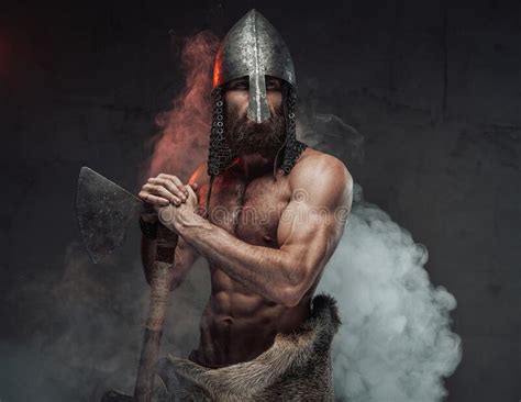 Nord Mad Viking Holding His Battle Axe In Dark Background Stock Photo Image Of Serious Nord