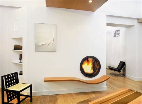 15 Of The Coolest Fireplaces To Curl Up Next To This Winter Abode