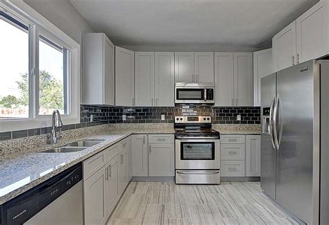 Modern kitchen room in a condo home. Grey Shaker Kitchen Cabinets | Custom Kitchen Cabinets ...