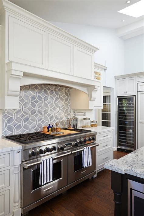 See more ideas about kitchen tiles backsplash, kitchen tile, at. Geometric Tile Backsplash Adds Modern Flair to White ...