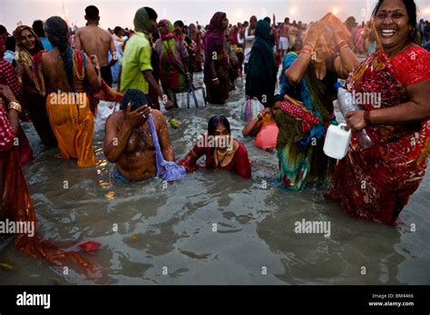 Pilgrims Bath In The Holy Water Of Gangasagar Island In West Bengal