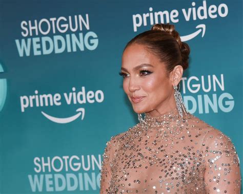53 Year Old Jennifer Lopez Looks Peachy Keen In Plunging Pink Bathing Suit
