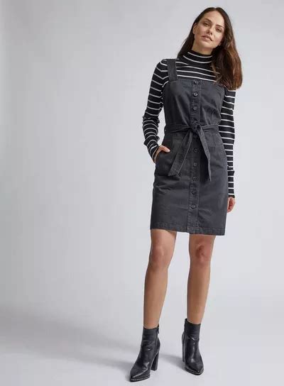 Black Belted Pinafore Denim Dress As Part Of An Outfit In Denim