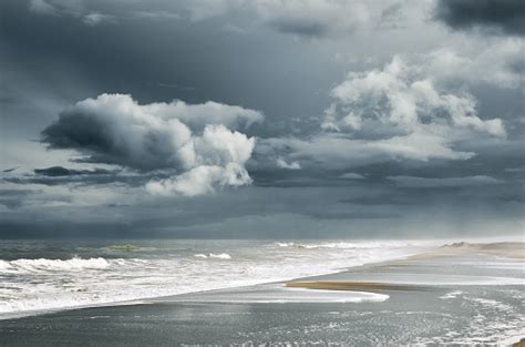 Stormy Sea Beach And Clouds At Dark Dramatic Sky Stock Photo Download