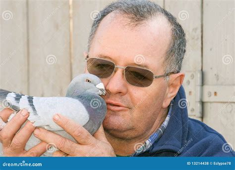 Man Holding A Pigeon Royalty Free Stock Photos Image 13214438