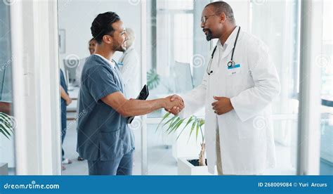 Doctor Handshake Or Nurse On Tablet In Hospital Teamwork Collaboration
