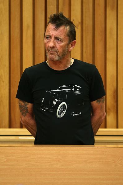 Acdc Drummer Arrested Videos Photos Phil Rudd Faces Murder For