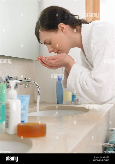 Woman Washing Her Face Stock Photo Alamy