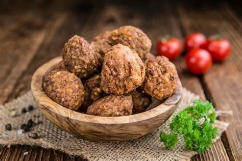Bake at 350 f for 25 to 30 minutes until meatballs register 165 f on a meat thermometer. Homemade Meatballs - When is Dinner