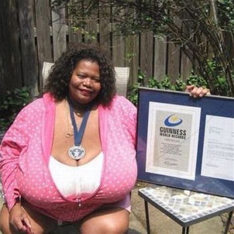 WOMAN WITH THE WORLDS LARGEST BREASTS ATTENDS AN EVENT ONLY IN BRA