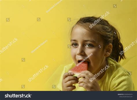 Happy Cute Female Child Eating Watermelon Stock Photo 2020545419