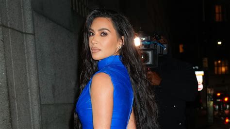 Kim Kardashians Hyper Reflective Bikini Is Traffic Cone Chic Teen Vogue