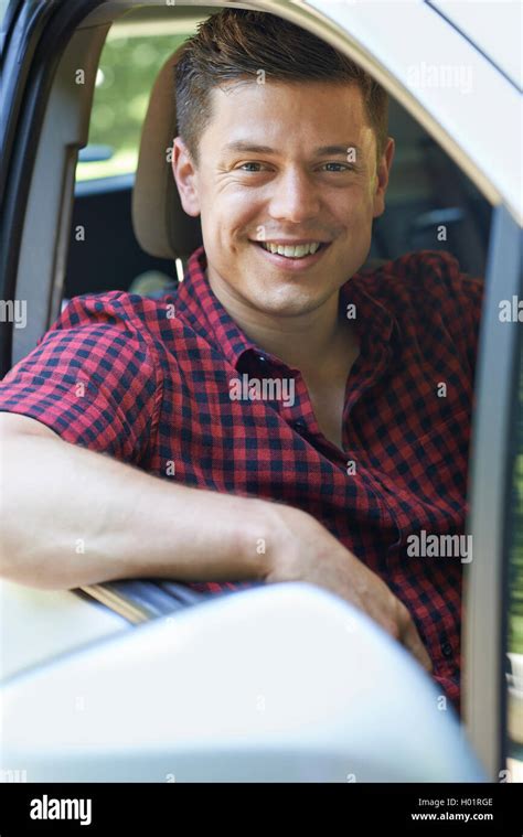 Portrait Of Man Driving Car Stock Photo Alamy
