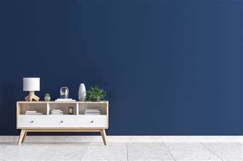 chest  drawers  living room interior dark blue wall mock  background stock photo