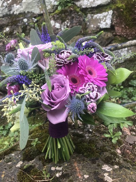 This is probably one of the easiest bouquet types to create. Hand tied spiral wedding bouquet | Purple wedding bouquets ...