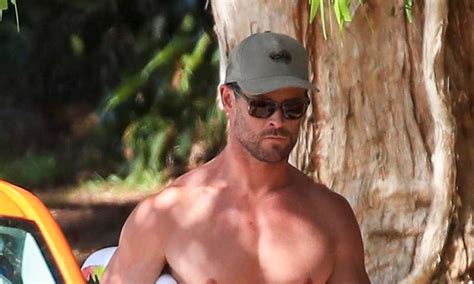 Chris Hemsworth Flaunts His Muscular Physique While Surfing At A Byron