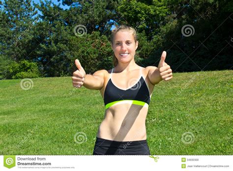 Fit Athletic Woman Giving Thumbs Up Sign Stock Photo Image Of Girl Athlete