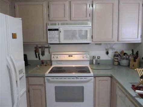 Now, i've moved them into a directory named after the program, and placed an __init__.py there to make a package. Pickled oak kitchen cabinets photos