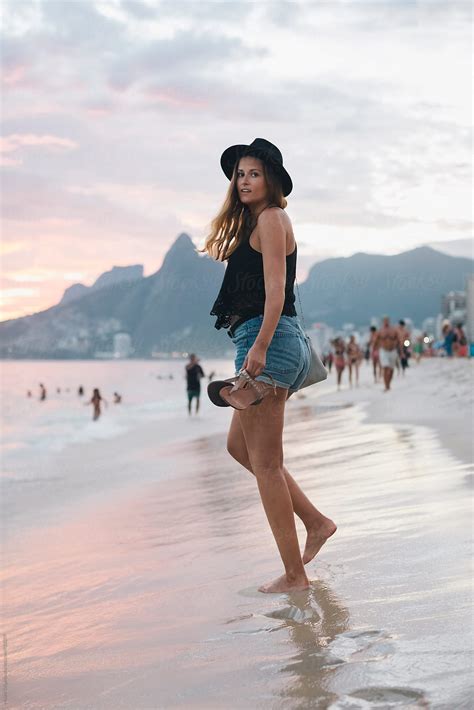 Rio De Janeiro Brazil Woman Walking On The Beach At Sunset By Mauro