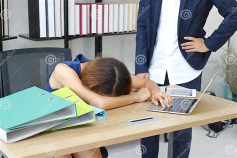 Tired Overworked Young Asian Business Woman Bend Down Head On Desk