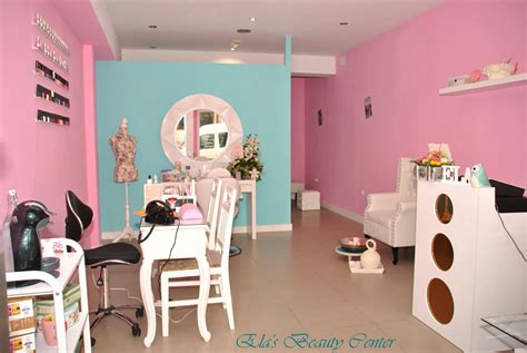 A Room With Pink And Blue Walls White Furniture And A Mirror On The Wall